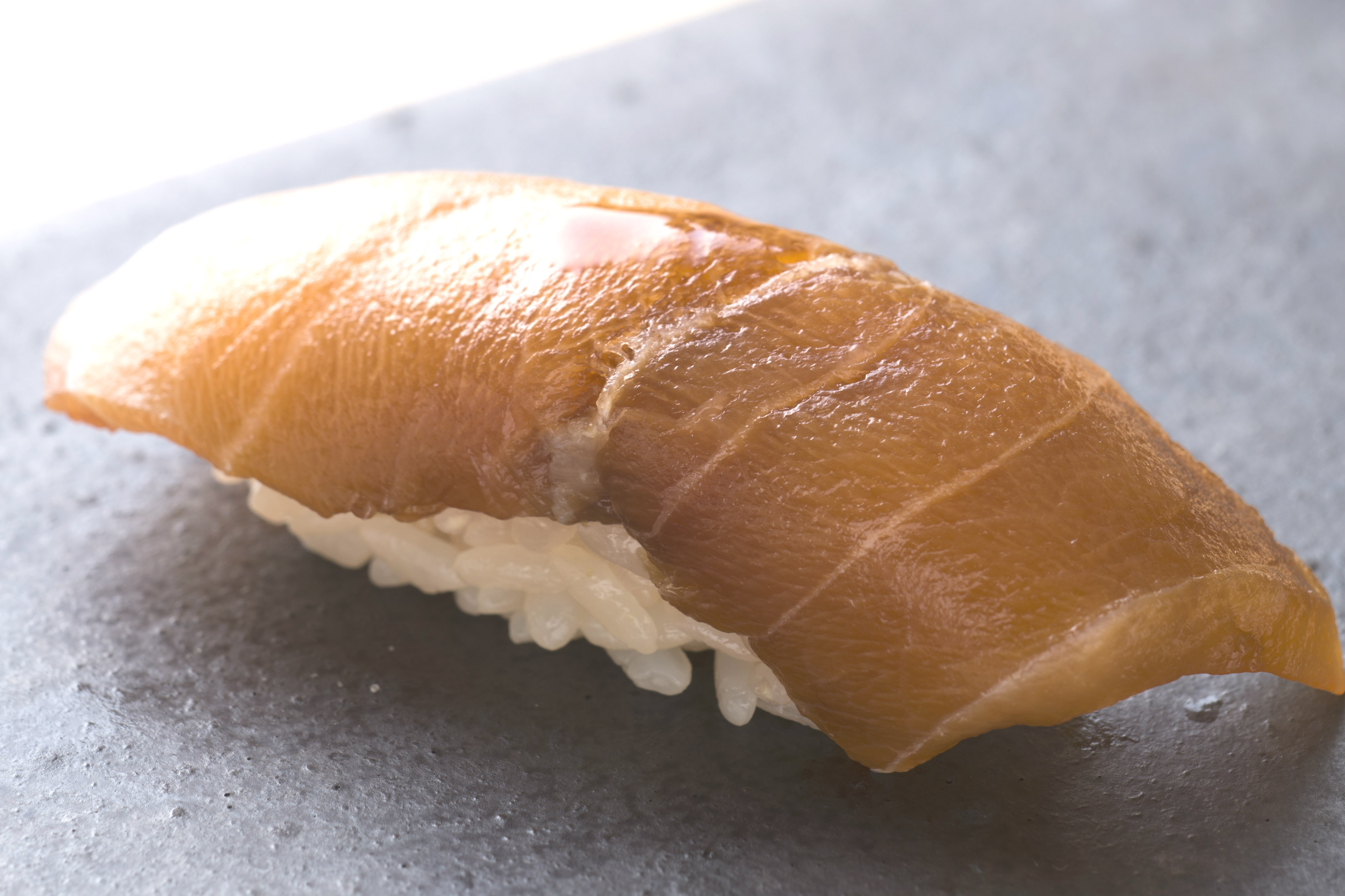 Chef Kimura's 60-day cured makajiki (striped marlin) proved that properly aged fish can develop so many wonderful new and delicious flavors. Credit: Copyright 2016 Hiroko Shimbo