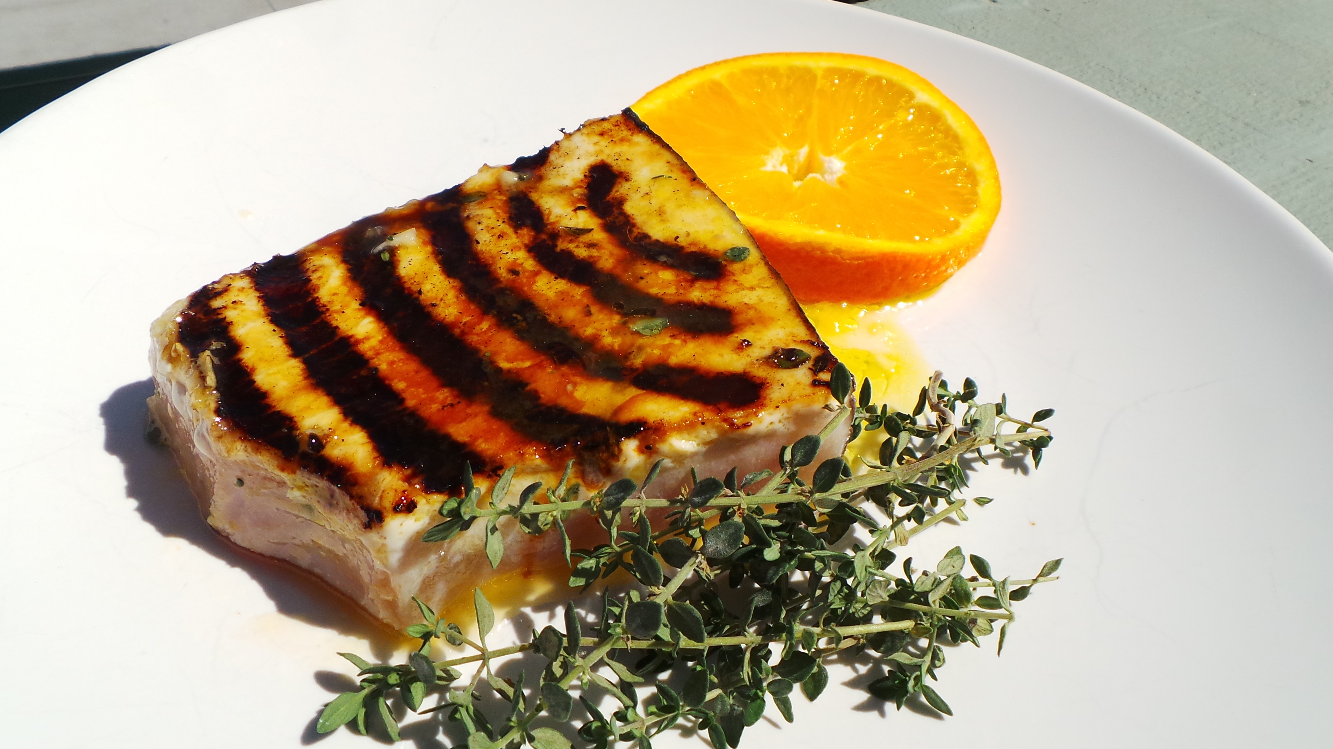Grilled swordfish in fresh orange juice and thyme. Credit: Copyright 2016 Clifford A. Wright